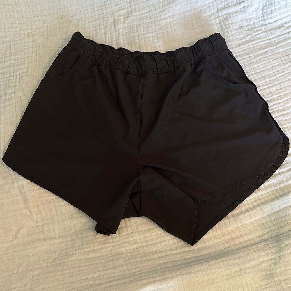 Torrid black dolphin hem swim board short sz